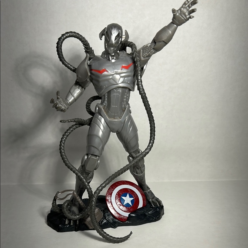 Silver and Red Action Figure with Shield